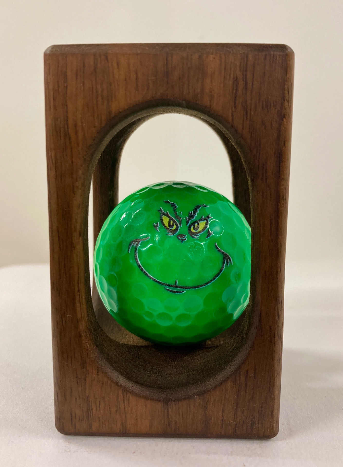 The Grinch — handmade golf ball fidget in hardwood crate